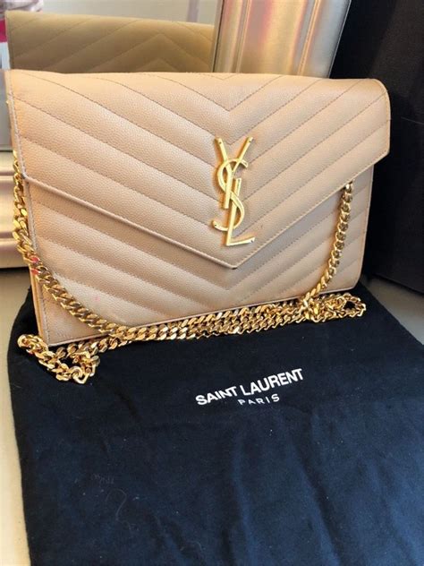 yves saint laurent clutch beige suedw|ysl st laurent handbags.